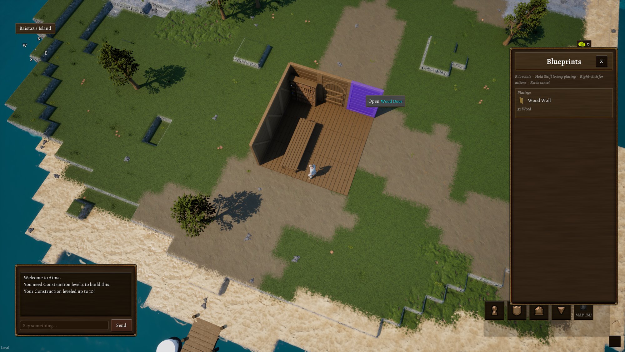 The player hovers to place a new wall which shows the preview in blue. A house in progress stands with a few walls, floor pieces, a table, and a book shelf.